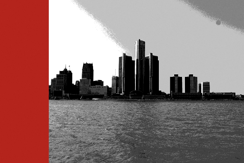 The Detroit skyline seen across the river from the far bank, with the glass towers of the Renaissance Center at the centre and low buildings to either side under a pale sky, in near black and white with a flat red band down the left edge