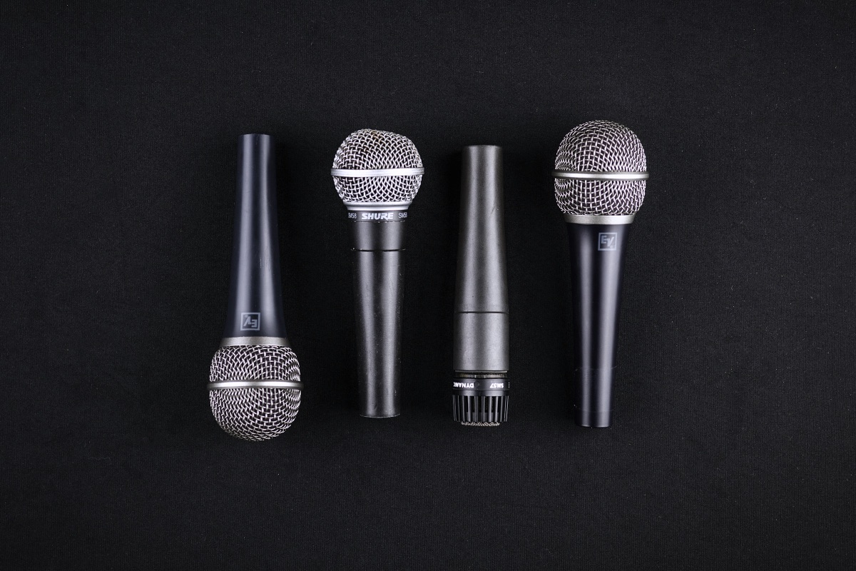 Four black microphones