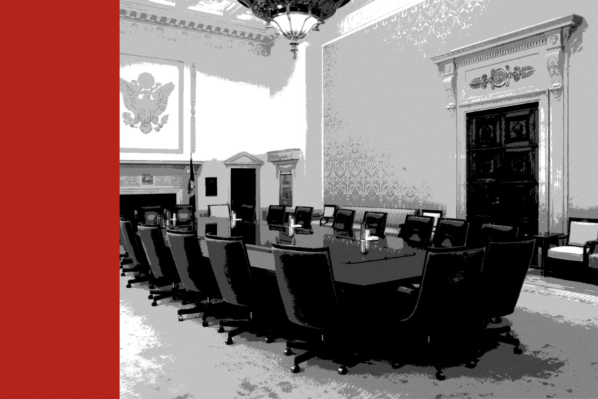 The Board room in the Marriner S. Eccles Federal Reserve Board Building in Washington, a long wooden conference table ringed by empty high-backed chairs under a chandelier, with a carved eagle on the far wall, in near black and white with a flat red band down the left edge
