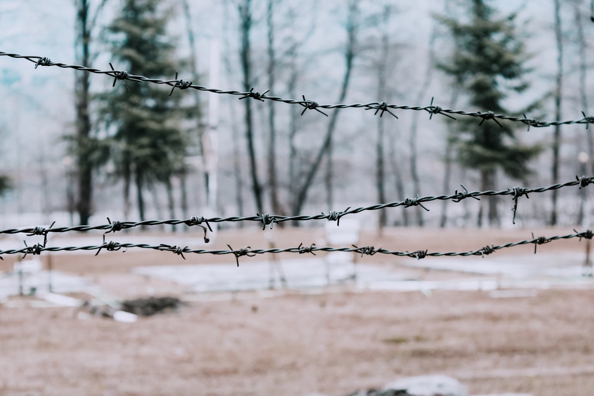 A fence with a wire fence