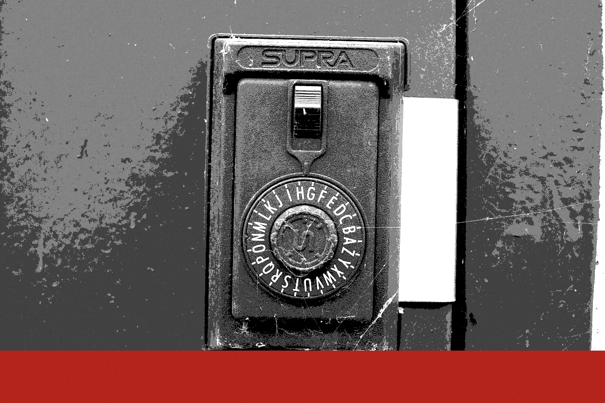 The dial of a combination safe lock, banded in the house treatment