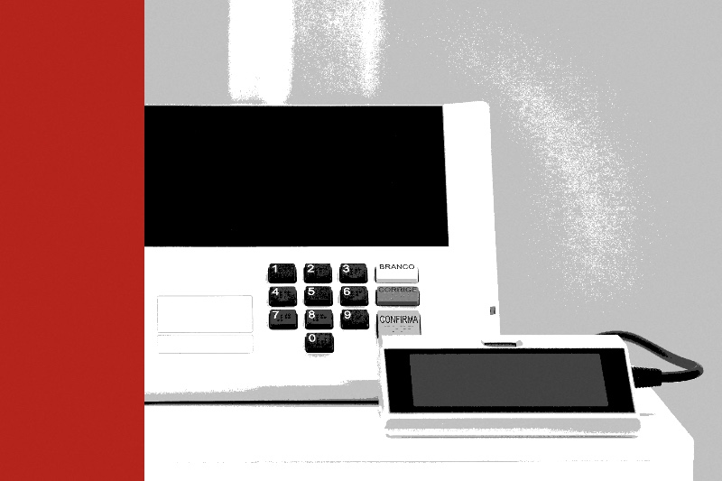 A Brazilian electronic voting machine, its numeric keypad beside the blank, correct and confirm keys, in near black and white with a flat red bar down the left edge of the frame