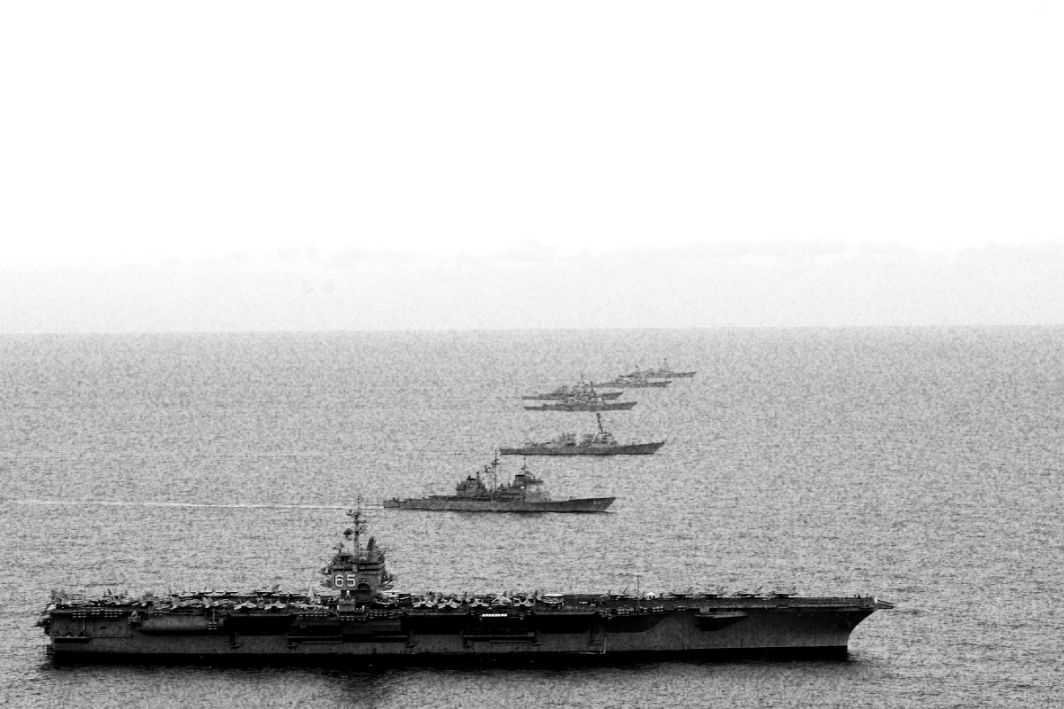 Warships steaming in formation, banded in the house treatment