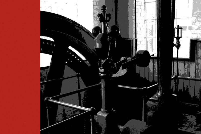 The flywheel and governor of a beam engine, banded in the house treatment