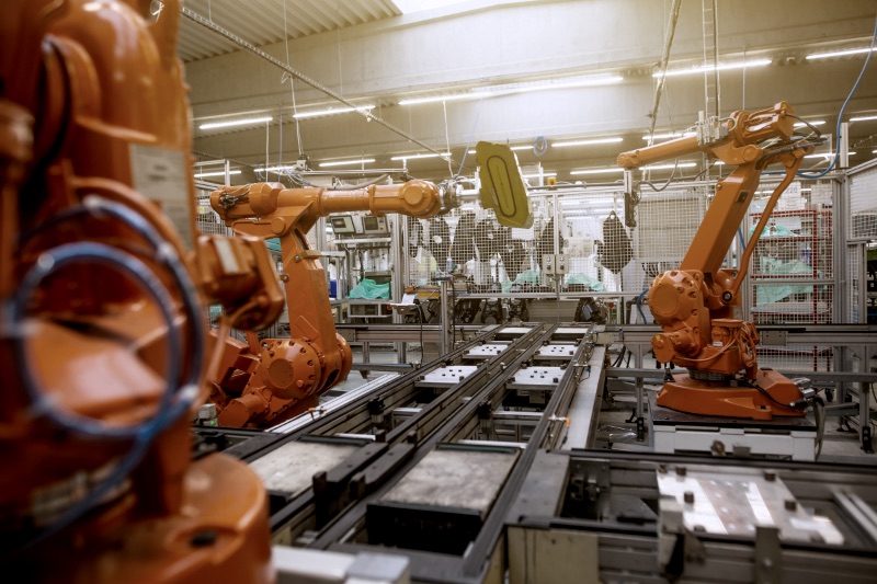 A factory filled with lots of orange machines