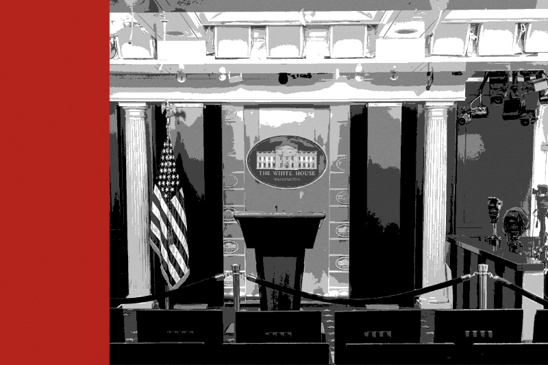 The James S. Brady Press Briefing Room at the White House, empty, with the podium roped off and rows of vacant seats