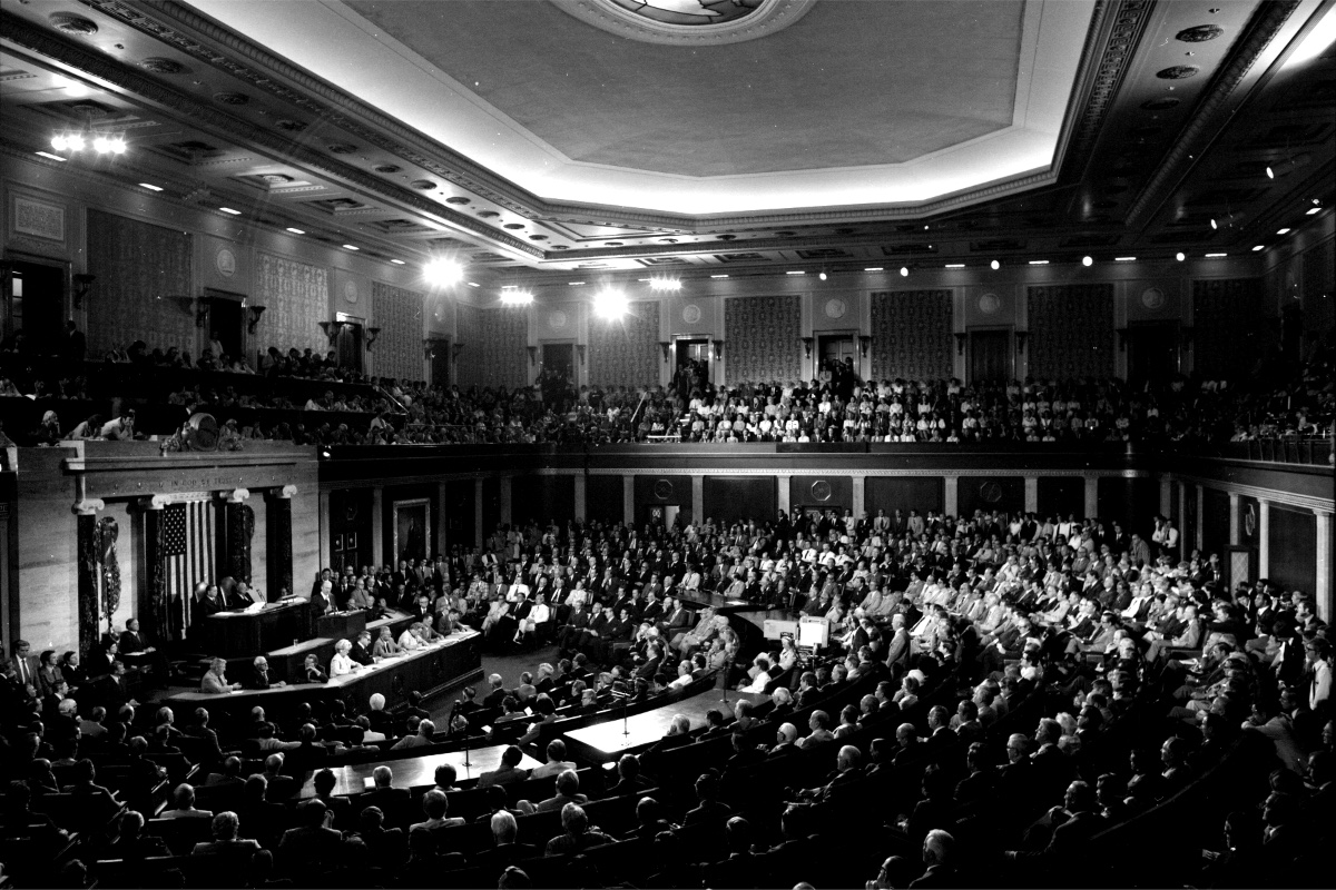 A wide view of the crowded chamber of the United States House of Representatives during a joint session of Congress, members seated at desks facing the rostrum