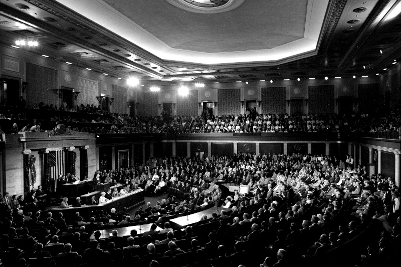 A wide view of the crowded chamber of the United States House of Representatives during a joint session of Congress, members seated at desks facing the rostrum