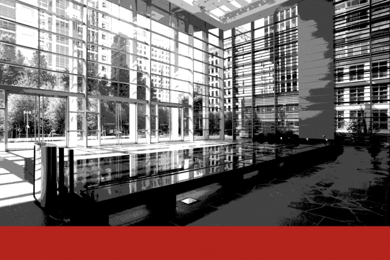 The glass lobby of the federal courthouse in Seattle, a long dark reflecting pool in the foreground and city towers seen through the curtain wall, in near black and white with a flat red band along the foot of the frame