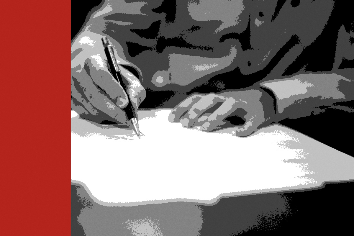 Man writing on paper
