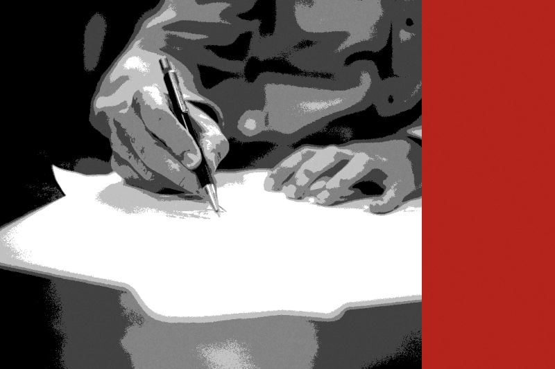 Man writing on paper